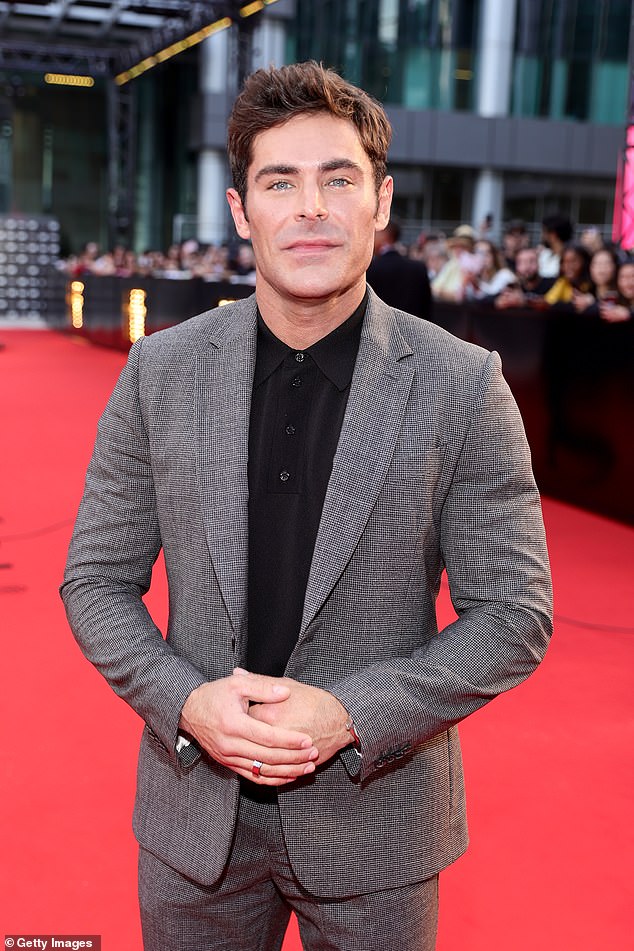 High School Musical star Zac Efron, just 36, blamed a collision with a granite fountain at his home for the new face he appeared in 2022. (Pictured: Efron in 2022).