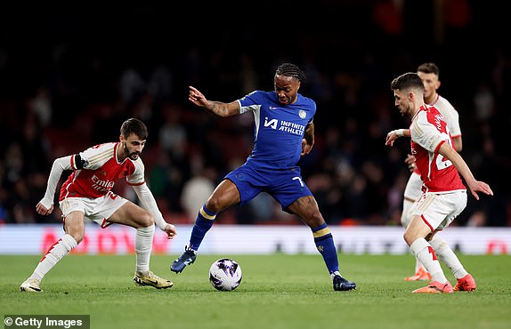 LONDON, ENGLAND - APRIL 23: Raheem Sterling of Chelsea Jorginho and Kai Havertz of Arsenal during the Premier League match between Arsenal FC and Chelsea FC at Emirates Stadium on April 23, 2024 in London, England.  (Photo by Julian Finney/Getty Images)