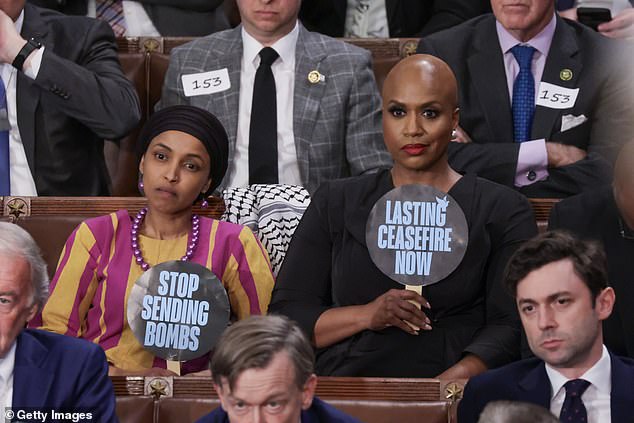 Rep. Ilhan Omar (D-Minn.) (left) and Rep. Ayanna Pressley (D-Mass.) (right) held signs calling for a ceasefire in Gaza.