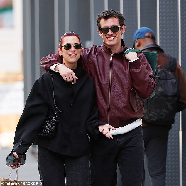 The pop icon, 28, and the British actor, 34, looked in good spirits as they settled in for a sunny outing in the city.