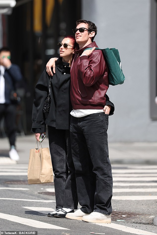 Meanwhile, the Fantastic Beasts alum looked equally stylish in a wine red leather bomber jacket with black denim, while carrying a green clutch.