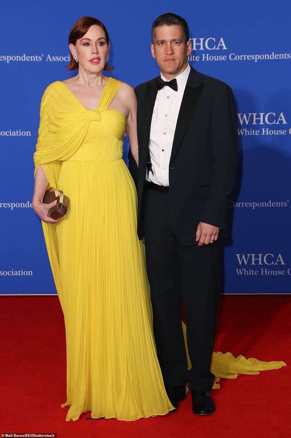 Ringwald struck various poses on the red carpet as she arrived at the event and was also accompanied by her husband and author, Panio Gianopoulos, whom she married in 2007.