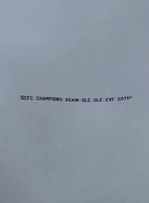 Meanwhile, Stockport fans waved a banner over the stadium during the warm-up highlighting the fact that they were champions.