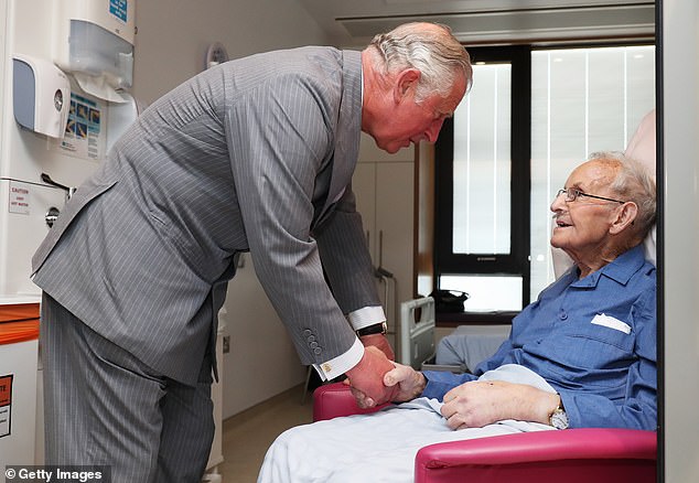 Charles meets a patient on a tour of the North West Cancer Center at Altnagelvin Hospital during a visit to Northern Ireland on May 9, 2017.