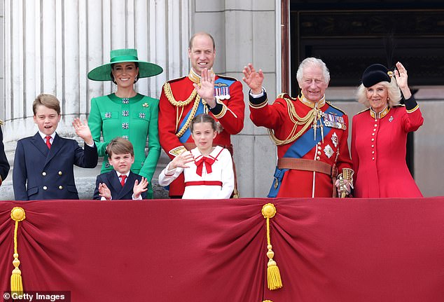 King Charles III and Queen Camilla salute alongside Prince William, Prince of Wales, Prince Louis of Wales, Catherine, Princess of Wales and Prince George of Wales on the balcony of Buckingham Palace during Trooping the Color in 2023 .