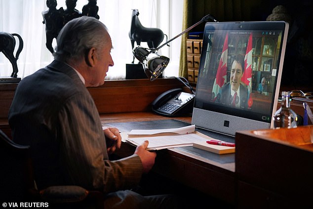 Charles chats with Canadian Prime Minister Justin Trudeau via video link on March 6.  He continued with his royal duties behind the scenes.