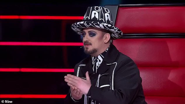 She ended up landing safely in The Voice coach Boy George's (pictured) lap.