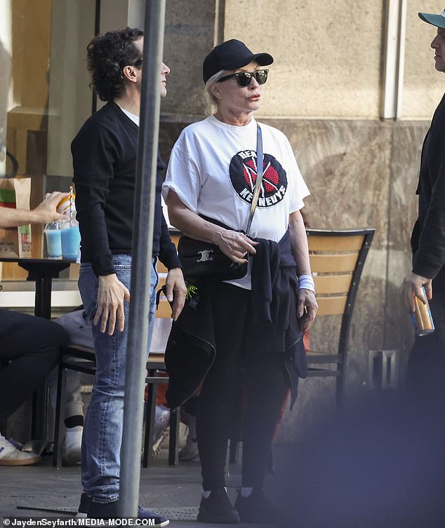 Debbie, who was born Angela Trimble, was wearing a white Dead Kennedys t-shirt, black yoga pants, thick-soled walking shoes and a black hoodie tied around her waist.