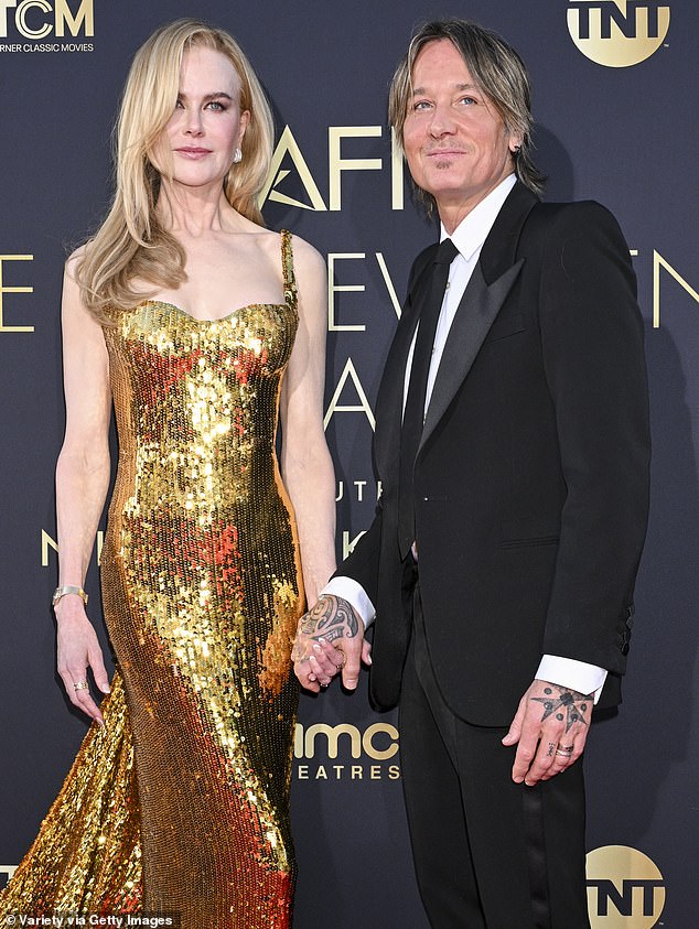The Oscar winner was accompanied on the red carpet by her husband Keith Urban (right), who also paid tribute to his wife on Instagram.