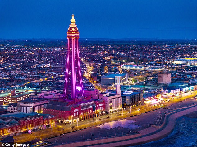 An aerial view of Blackpool Tower and the seafront at night on April 17, 2024.