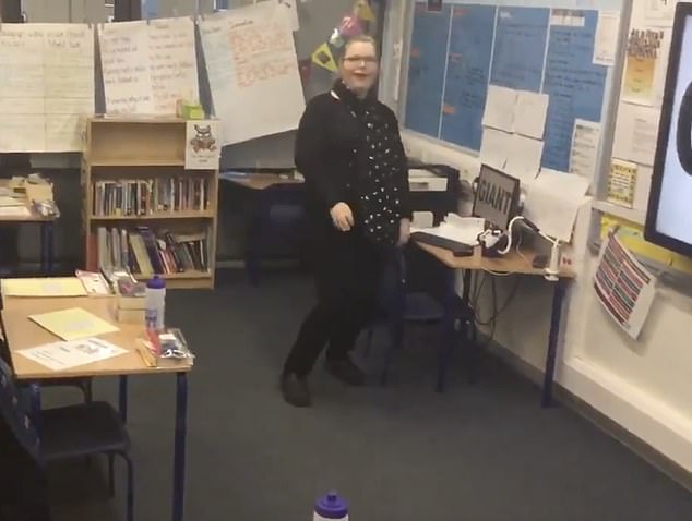 The murderer is seen performing a dance routine and laughing at the school where she taught