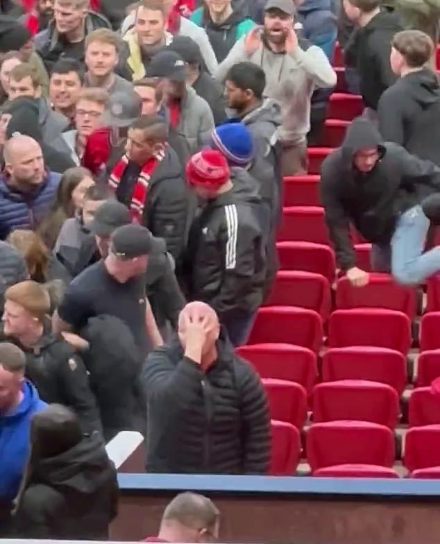 A Manchester United fan was seen making disgusted gestures during the FA Cup victory over Liverpool.
