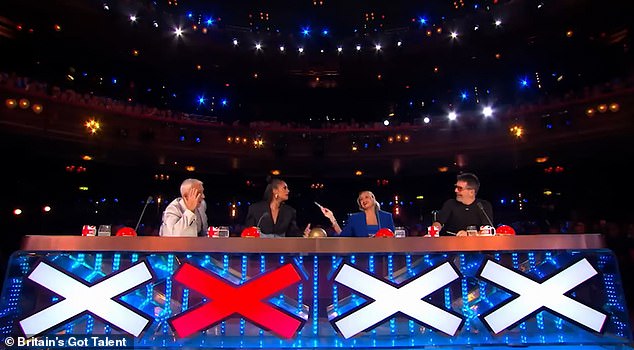 Judges Bruno Tonioli, Amanda Holden and Simon Cowell were impressed by the bizarre act, but Alesha Dixon (second left) was not.