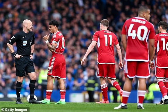 LIVERPOOL, ENGLAND - APRIL 21: Morgan Gibbs-White of Nottingham Forest complains to referee Anthony Taylor during the Premier League match between Everton FC and Nottingham Forest at Goodison Park on April 21, 2024 in Liverpool, England.( Photo by Robbie Jay Barratt - AMA/Getty Images)