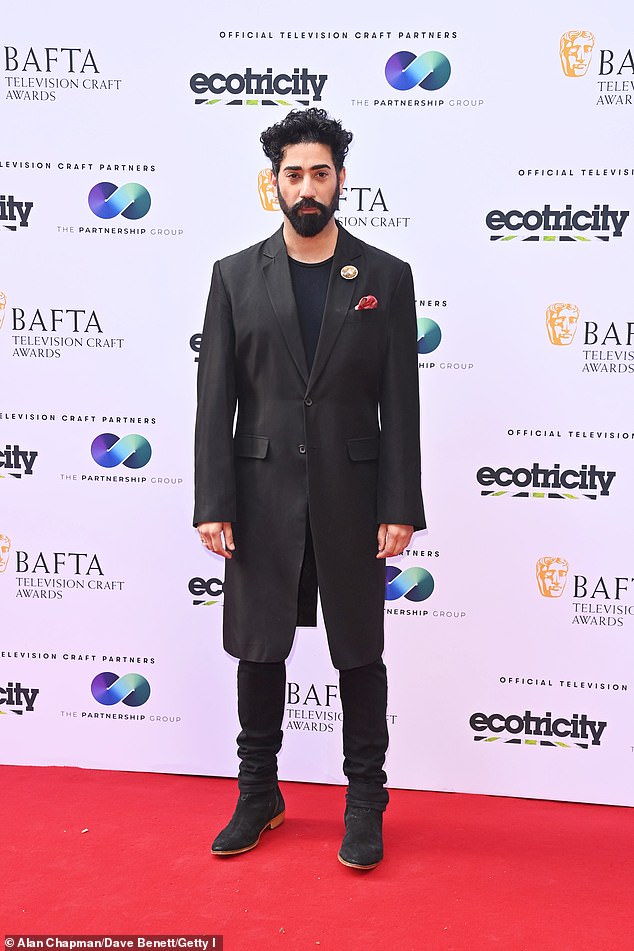 Marcella star Ray Panthaki sported a stylish black coat while posing on the red carpet.