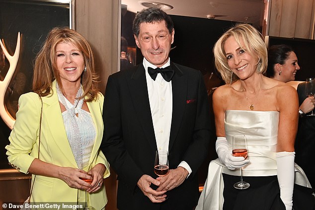 Emily wore her cropped blonde locks down and opted for soft touches of makeup (pictured with Kate and Jon Sopel)
