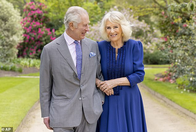 The King will return to public duties this week with the blessing of his doctors.  Pictured: King Charles and Queen Camilla in the gardens of Buckingham Palace on April 10 this year.