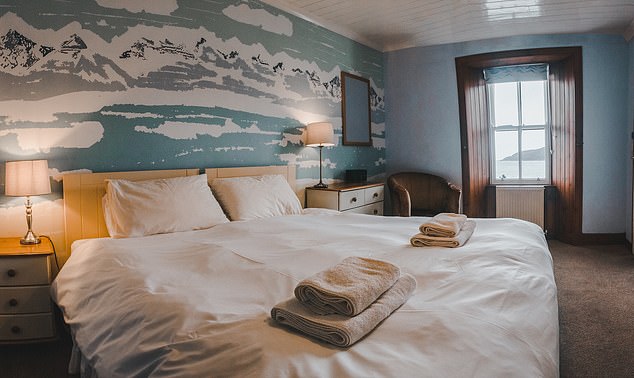 The rooms at the Applecross Inn in Wester Ross are decorated in a soothing blue and offer views stretching to the Isles of Skye and Raasay.