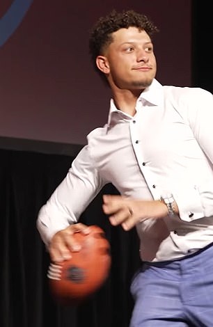 Mahomes throws the ball to Kelce at his charity gala