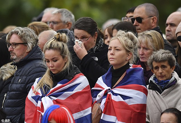 Pictured: Mourners at Westminster Abbey following the Queen's death.