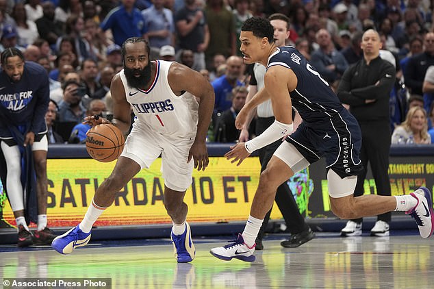 Harden passes to Dallas Mavericks guard Josh Green during the first half of Game 4