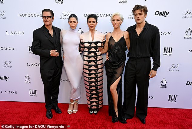 She attended with Harry, as well as her daughters Amelia Gray Hamlin, 22, and Delilah Belle Hamlin, 25;  Pictured from left to right: Harry, Amelia, Lisa, Delilah and Delilah's boyfriend, Henry Eikenberry.