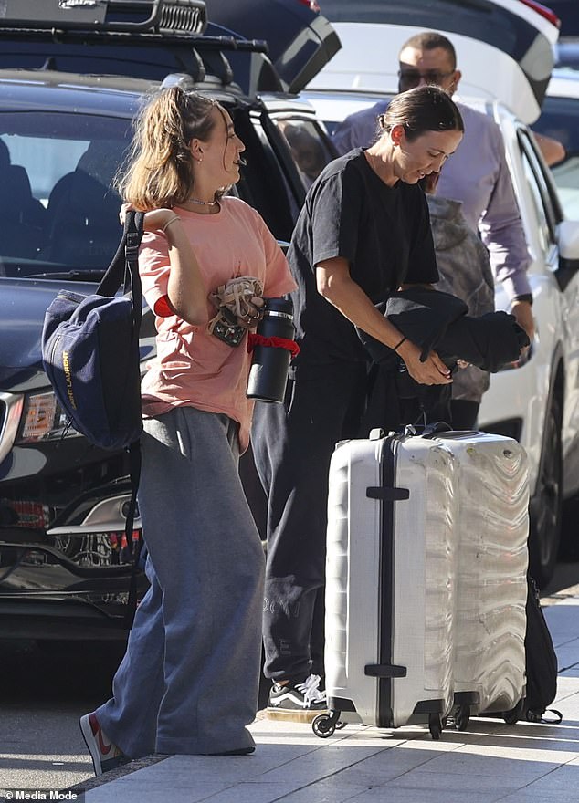 Hoisting a backpack over her shoulder, the Nickelodeon star donned a pastel pink T-shirt and baggy gray sweatpants over a pair of Nike shoes.