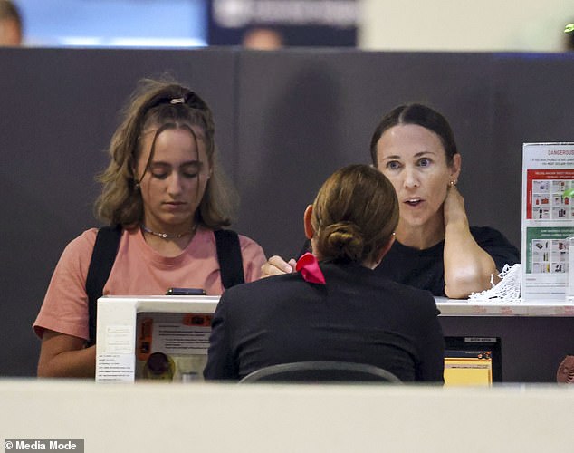 Bec and Ava were later seen inside the airport at the check-in desk.