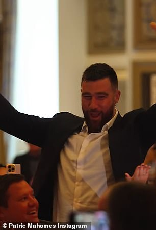 Kelce triumphantly caught the ball across the ballroom, and each autographed football was later auctioned off for $10,000 each.
