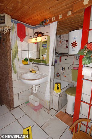 Crime scene evidence shows bathroom the family had to share