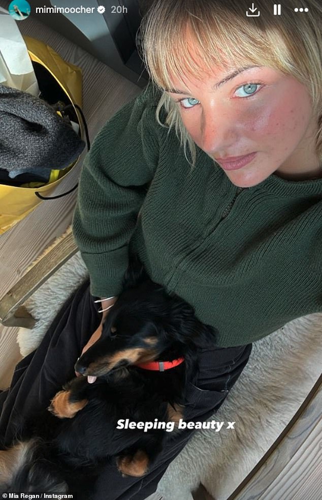 Mia may also have brought her dachshund to the property, as she shared a photo of the long-haired dachshund sleeping on her.