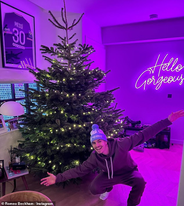 In another snap taken at Christmas, Romeo gave fans a sneaky look at the couple's living room as he posed next to their huge Christmas tree.
