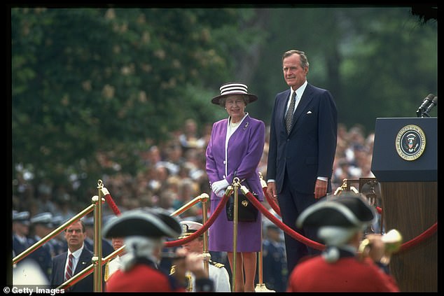 President George HW Bush (right) and Queen Elizabeth (left) pose for photographs on the South Lawn of the White House during the Queen's state visit to Washington, DC in 1991.