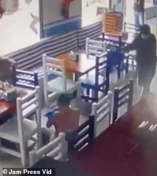 The attackers break into the restaurant
