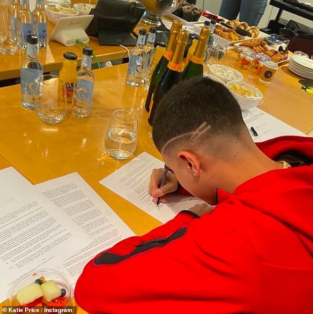 Junior landed a huge new record deal with Harry Styles' Columbia label in 2021 (pictured signing his contract)
