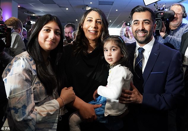 Humza Yousaf with his wife Nadia El-Nakla, daughter Amal and stepdaughter (left) at Murrayfield Stadium in Edinburgh on March 27, 2023.