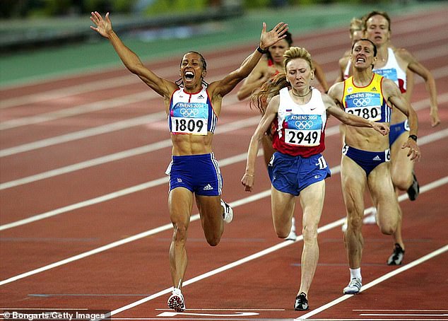 Although Dame Kelly, now retired, is famous for breaking British running records and winning two gold medals at the 2004 Olympics (pictured), she later discovered that joint pain stemming from perimenopause was halting her ability to remain active.