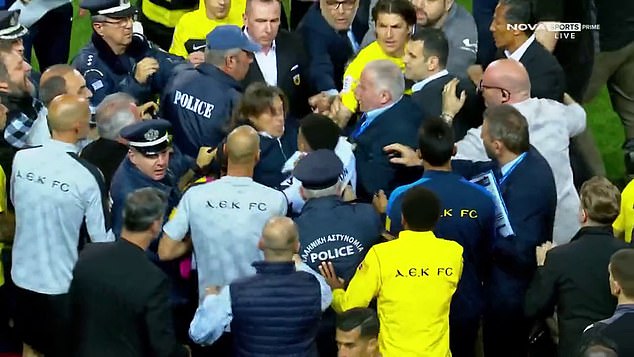 Almeyda was seen grabbing an individual by the neck before being pulled out of the melee.