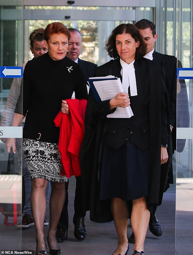 Hanson (left) and Chrysanthou (right) leave the Supreme Court in Sydney during their case against Faruqi on Monday.