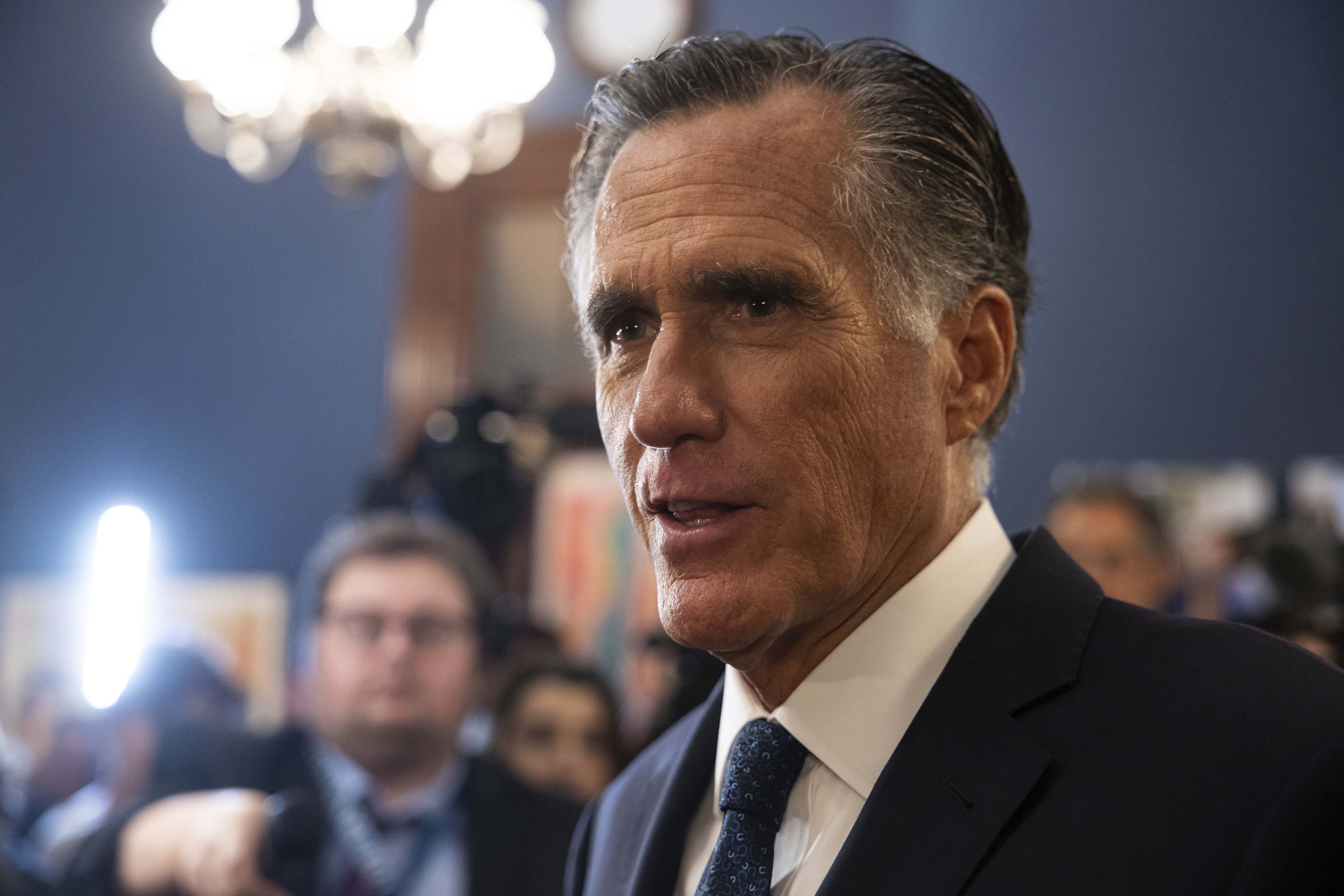 Senator Mitt Romney speaks to reporters in his office on Capitol Hill on September 13, 2023.