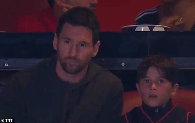 Messi was joined at the game by his eight-year-old son Mateo while they watched the Heat.