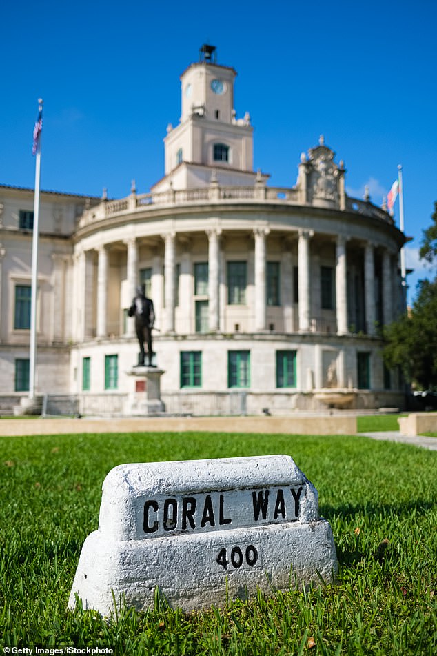 Coral Way street sign and classic architecture of the Town Hall building