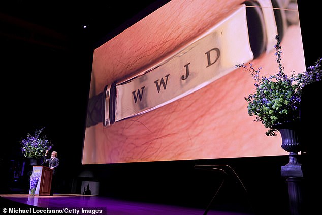 The BMW brand ambassador took to the stage to ask himself 'WWJD' or 'What Would Jeff Do' while paying tribute to his former Hell or High Water co-star, 74, on the podium?