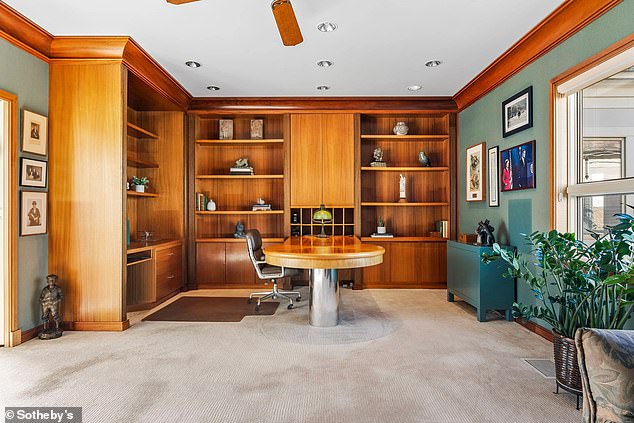 A wood-paneled office makes working from home easy