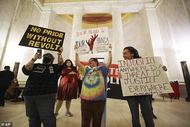 An appeals court ruled that West Virginia's ban on transgender sports violates the 13-year-old athlete's rights under Title IX (pictured: a protest at the state capitol in Charleston in 2023)
