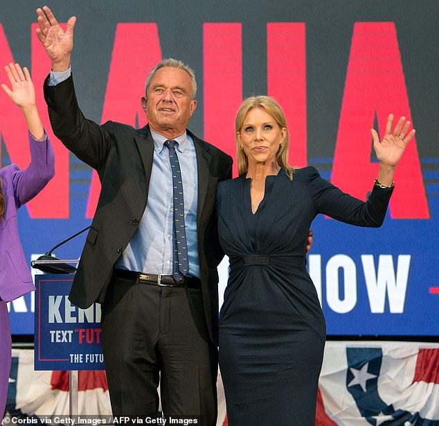 Kennedy is seen during a recent campaign rally alongside his wife, actress Cheryl Hines.