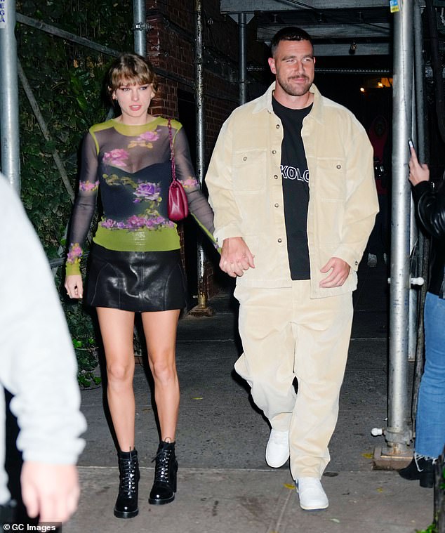 TMZ reported that both Taylor and Travis had received individual invites, but he will not be attending her win; photographed in October in New York