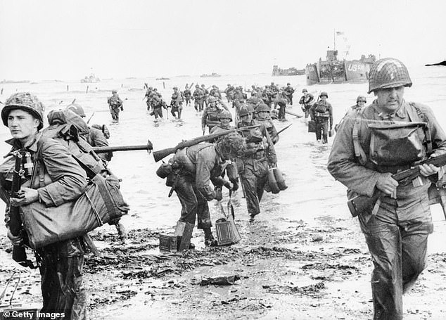 American assault troops seen here landing on Omaha Beach during the invasion of Normandy on June 6, 1944.