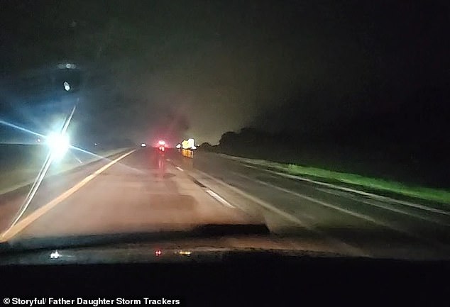 Jesse Rossi and his wife are heard discussing the cloud formation in front of them when they see lightning and realize they are directly in front of the tornado.