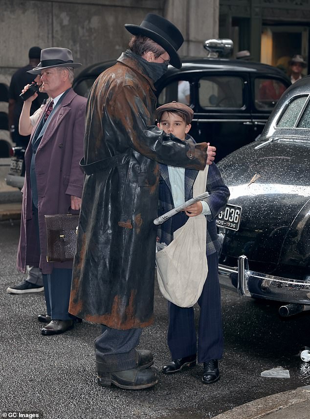 It was a family affair as the actor, 50, who plays Dr. Frankenstein's monster in the film, was accompanied by his youngest son, 10, who appeared to be playing an extra.